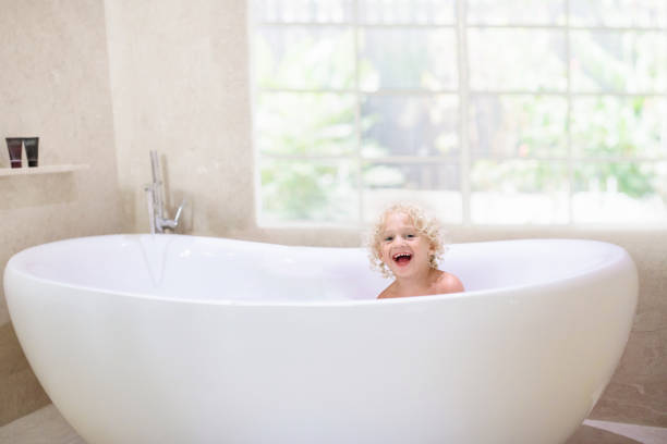 istock Kids in bath rub. Child bathing. 1485538079