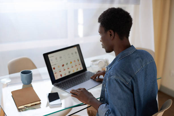 istock Black man ordering online grocery delivery 1485541787