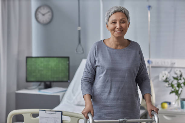 istock Senior patient with walker in hospital 1485542122