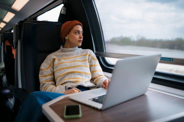 istock Woman traveller relaxing while traveling by the train 1485544025