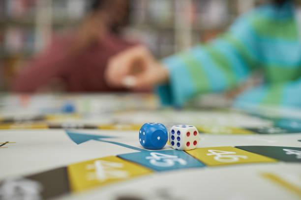 istock Closeup board game background with focus on dice pieces 1485548941