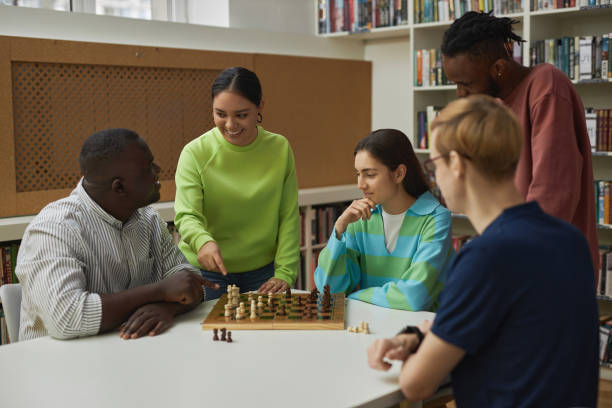 Group of young people in chess class