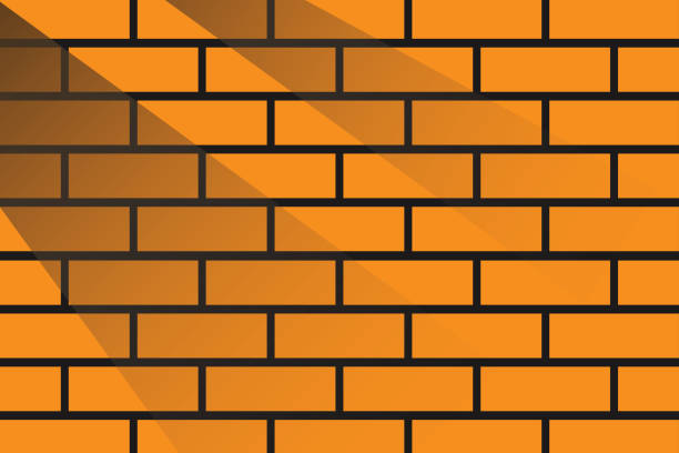 istock Orange brick wall with dark shadow on black background. Design for your product or loft background and interior decoration. 1485566511