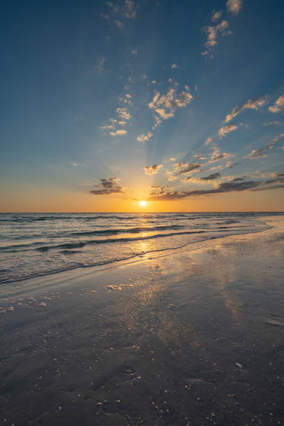 Vibrant Sunset at Treasure Island Beach on the Gulf Coast of Florida USA stock photo