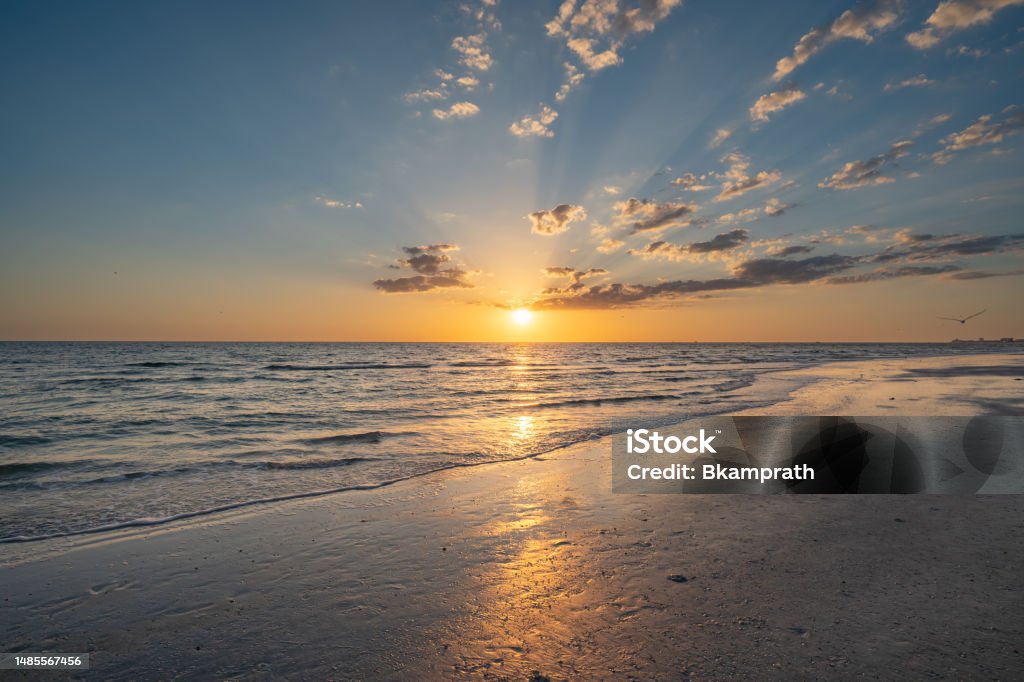 Vibrant Sunset at Treasure Island Beach on the Gulf Coast of Florida USA Vibrant sunset at Treasure Island Beach on the Gulf Coast of Florida USA Florida - US State Stock Photo