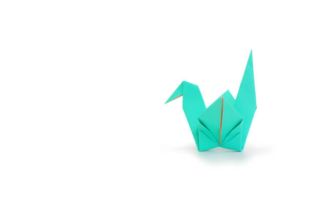 istock Origami bird isolated on white studio background. Image with Clipping path and copy space 1485572945