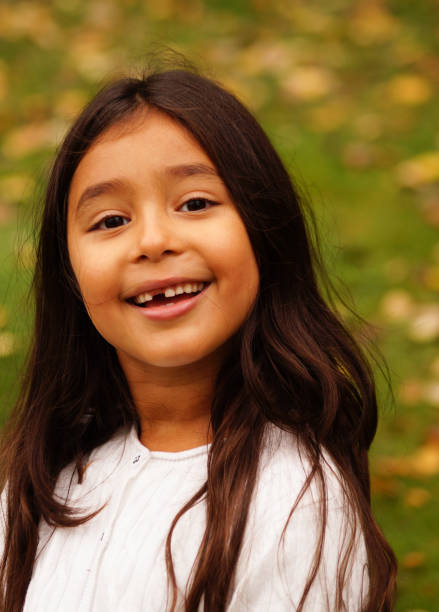 Portrait of a child outdoors during autumn