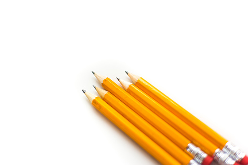 Five Pencils on White Background