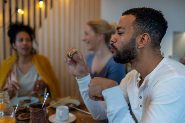istock Breakfast in pajamas with visiting friends 1485575846