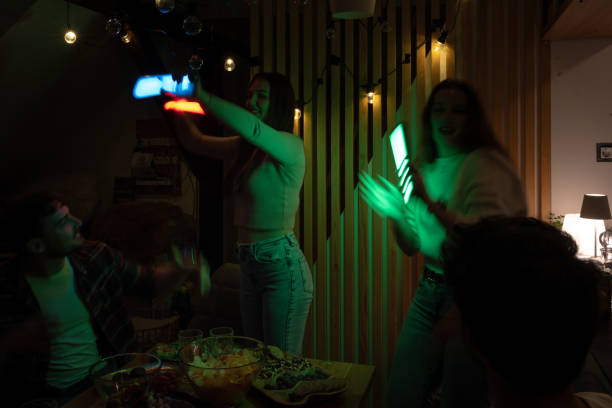 istock Youth party at home with neon lights 1485576416