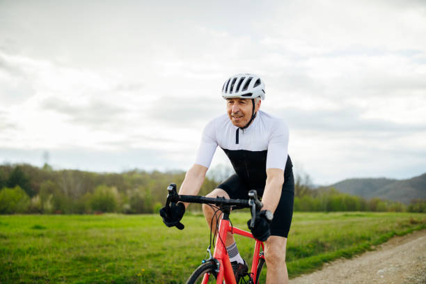 istock Senior man in good athletic shape riding a bike. 1485576755