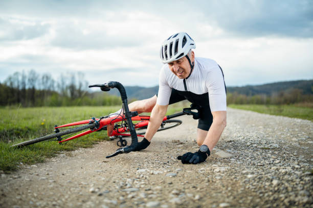istock Senior bicyclist falling from his bike. 1485576799