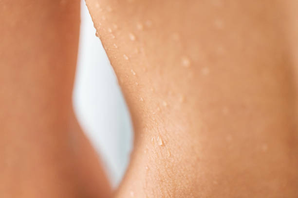 istock Drops of water on the body 1485587938