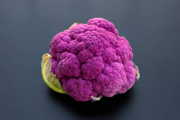 istock Purple cauliflower on dark background. 1485593407