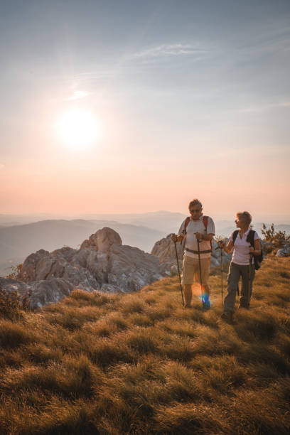 istock Senior Husband And Wife Walking Side By Side, Exploring And Enjoying Nature 1485593442