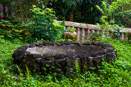 An abandoned well on the lawn