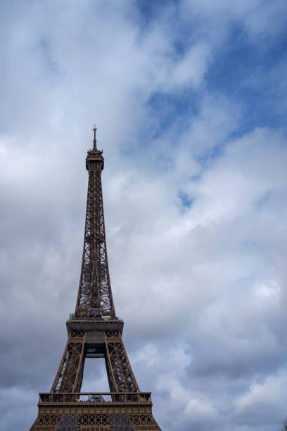 istock Eiffel Tower against the cloudy blue sky 1485602481