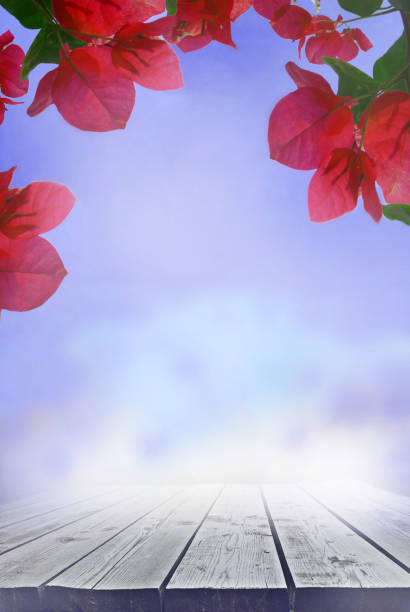 istock Wood floor or plank table with floral tropical summer background. Empty space for text or presentation product 1485602916
