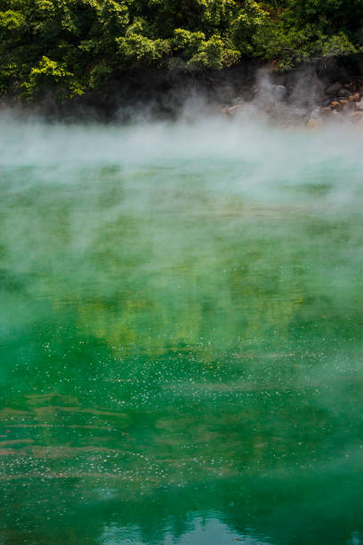 istock The green sulfur spring with white smoke 1485604840