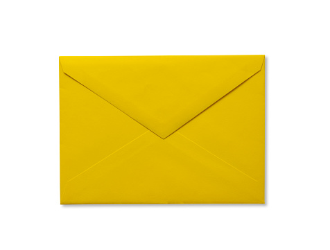 Close-up of closed yellow paper envelope on white background.