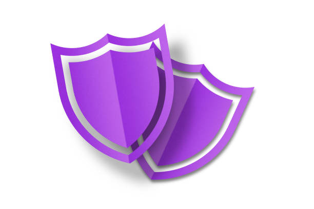 purple paper shield Paper cut punched into shield shape isolated on white background.