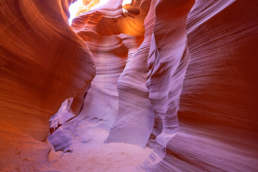 Navajo Upper Antelope Canyon is a slot canyon in the American Southwest, on Navajo land east of Lechee, Arizona. It includes five separate, scenic slot canyon sections on the Navajo Reservation, referred to as Upper Antelope Canyon (or The Crack), Rattle Snake Canyon, Owl Canyon, Mountain Sheep Canyon and Lower Antelope Canyon (or The Corkscrew). It is the primary attraction of Lake Powell Navajo Tribal Park, along with a hiking trail to Rainbow Bridge National Monument.