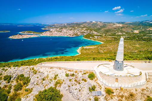 Gigantic Virgin Mary statue on hill above Primosten aerial view, Dalmatia region of Croatia