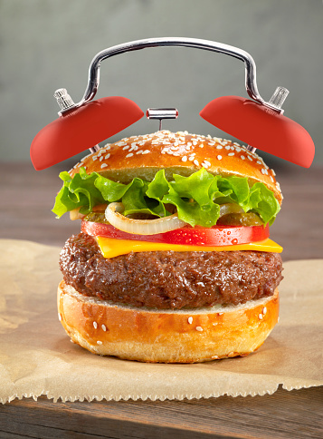 delicious Cheeseburger with alarm clock bells
