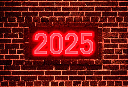 2025 Neon sign on a brick wal