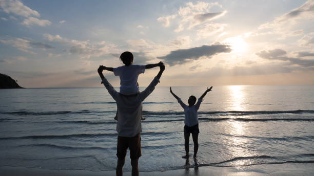 istock Happy Asian Family on the Beach 1485636548