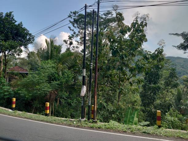 istock Old electric tower in Indonesian mountain settlements 1485637545