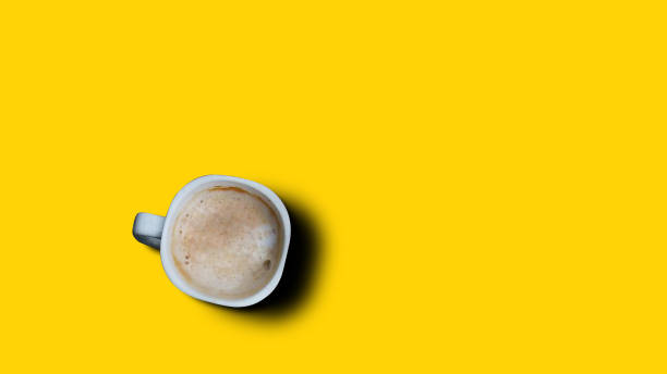 istock Top view, flat lay of black coffee cup on background yellow. 1485644252