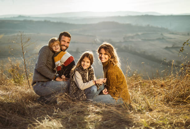 istock Young happy family relaxing in autumn day. 1485646516