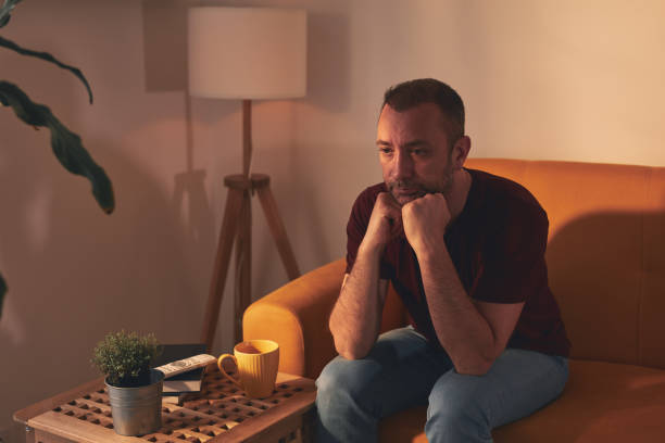 istock Bored man with lethargy and apathy sitting at home alone. 1485646889