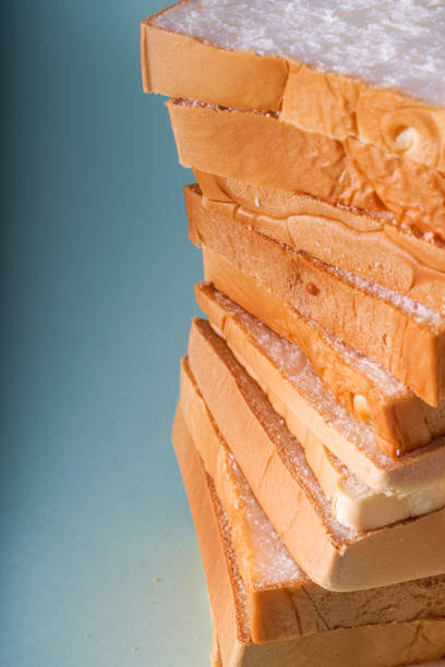 istock Toast bread slices stacked into towers 1485653278