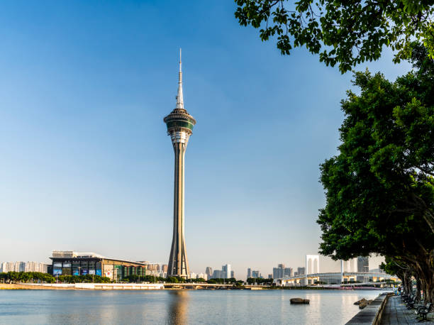Macau- September 20, 2019: Building view of Macau Tower and Sai Van Bridge crossing Praia Grande Bay (Nam Van) and connecting Taipa Island and Macau Peninsula. Amazing Macao skyline. Wonderful cityscape.