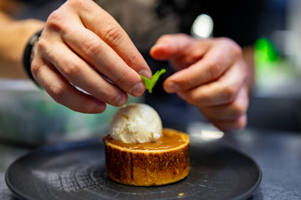 istock chef decorated chocolate fondant cake with ice cream and caramel 1485654030