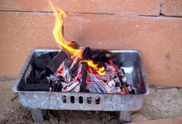 istock Preparation fire and coal for cooking barbecue outdoors 1485656130
