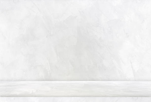 istock background and concrete backdrop and cement shelf showing products in black and gray , empty studio interior and with empty messages background. 1485656324