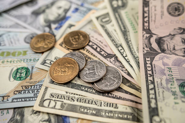istock American money paper bills with coin cent 1485656910