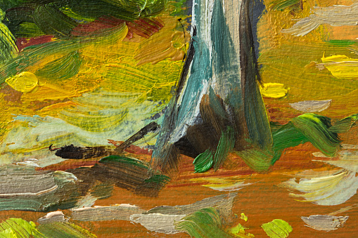 Yellow-green abstract background painting. Bright multicolored oil paint strokes on the canvas. A fragment of a picture of the forest. Juicy artistic spring background. Mixing colors summer texture