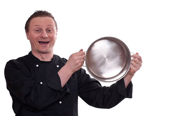 istock Laughing cook is upholding a pot 148565990