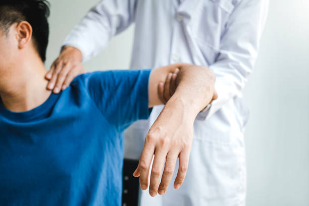 istock Physical Doctor consulting with patient About  muscule pain problems Physical therapy diagnosing concept 1485660136