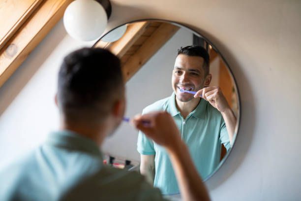 istock Man at home brushing his teeth in the morning. 1485661163