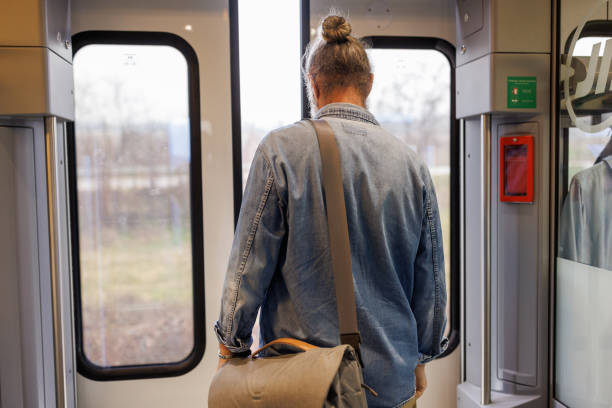 istock One mature man getting out the train 1485664719