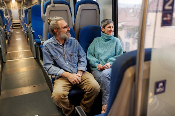 istock Mature couple traveling by train 1485665092