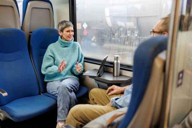 Mature couple traveling by train