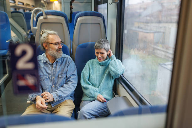 istock Mature couple traveling by train 1485666001
