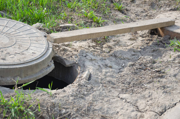 istock The hatch on the ground is open, the hole in the ground 1485668252