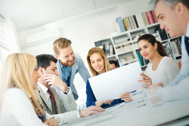 istock Brief business meeting at the office. 1485669930